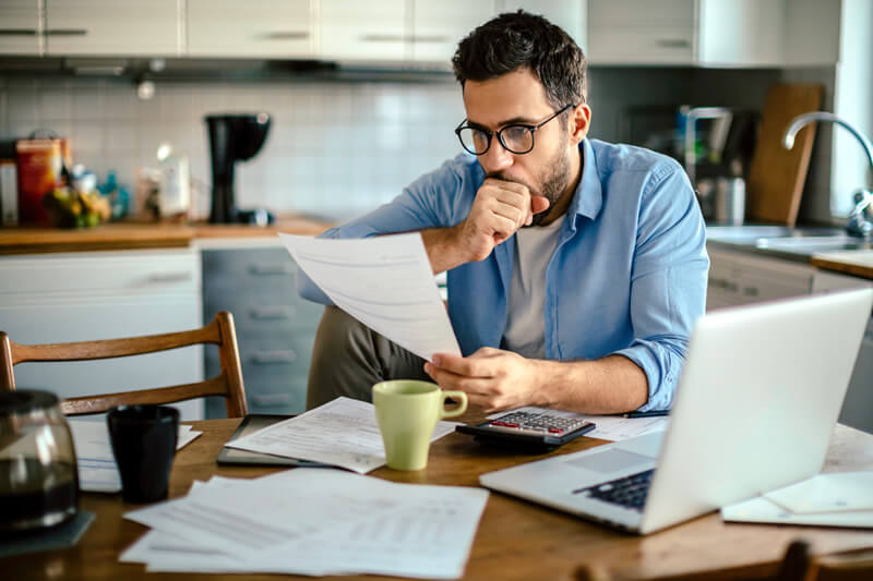 Person planning debt payoff strategy