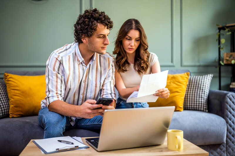 A couple reviews their retirement account options